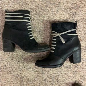 Black boots with wrap around shoelace design